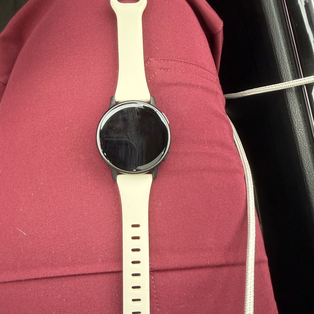 Garmin Smartwatch with Black Face and Cream Band